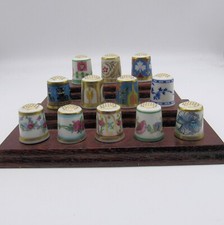 MINTON BICENTENARY COLLECTION, 12 THIMBLES WITH WOODEN DISPLAY STAND