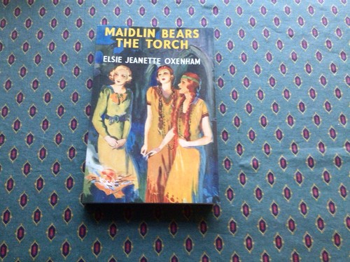 Maidlin bears the torch - torch,