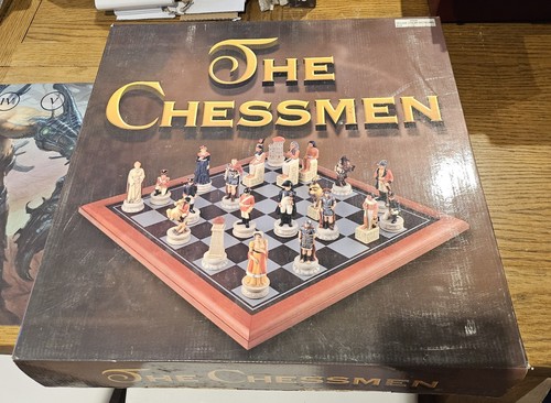 The chessmen new and boxed - new,
