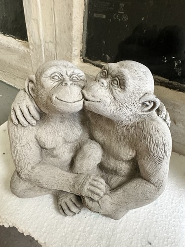Concrete kissing monkeys - kissing,