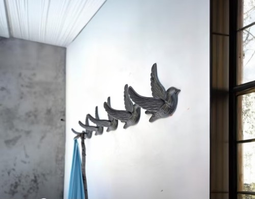 Cast iron flying bird - cast,