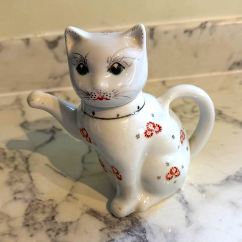 Cat shaped ceramic cup - shaped,