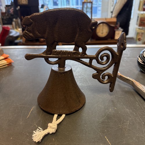 Cast iron bell with pig - cast,