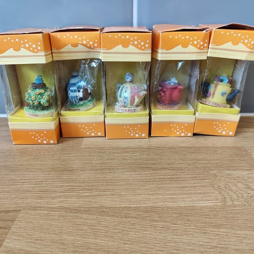 Tetley tea folk teapots - tetley,