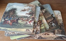 A set of 8 table mats of