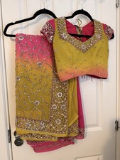 Pink and yellow/green saree