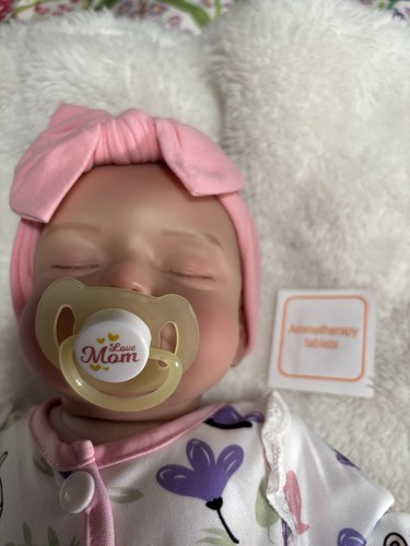 Reborn baby doll - vinyl, light