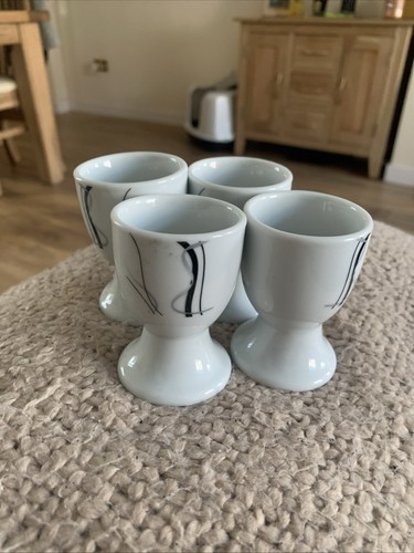 Teloni egg cups crafted - cups.,