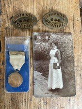 WW1 Red Cross Society Medal,  Brass Shoulder Titles and Postcard Red Cross Nurse