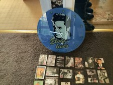 Elvis Large Glass Clock Elvis Gum Card,s & an Elvis Belt Buckle & Belt £40.00
