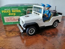 T.N. Nomura Toy Police Patrol