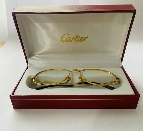 Cartier golden glasses frames - cartier,