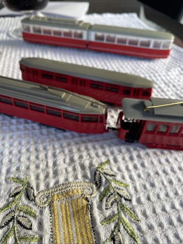 Three austrian plastic trams - three,