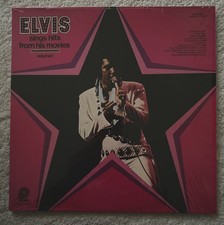 Elvis Sings Hits From His