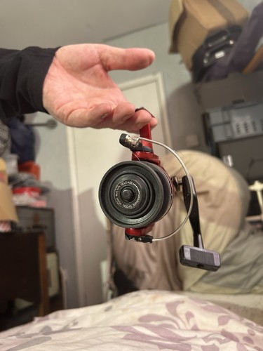 Red fishing reel - red,