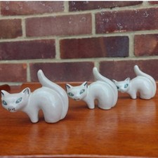 trio of vintage stylised stoneware studio pottery CATS with handpainted accents