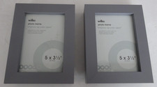 A PAIR GREY PHOTO FRAMES - 13 X 9CM