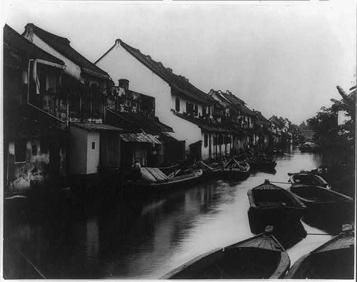 Java small boats on village - java,