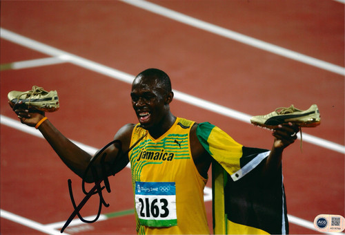 Usain bolt signed 12x8 - usain,