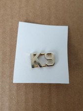 Obsolete K-9 collar badge