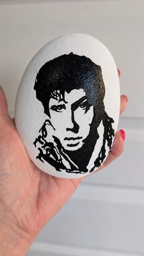 Hand painted pebble shakin - hand,