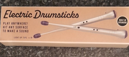 Electric drumsticks with built - drumsticks,