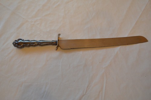 Unbranded cake knife cutting - cake,