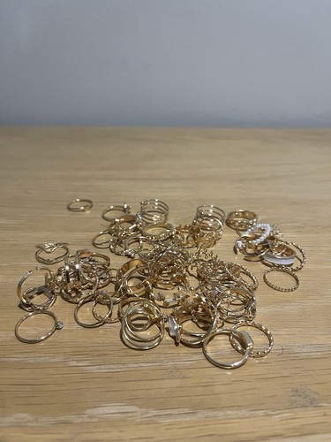 Bundle gold tone rings - of,