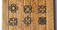 Miniature Metal embellishments for Tudor Dolls houses in 6 different styles.