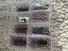 Box of universal sewing machine needles, assorted sizes