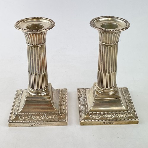 Pair silver weighted - of,