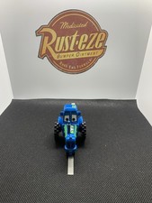 Disney Cars Diecast Clutch Aid Racing Tractor 1:55 Scale