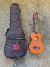 Small 4 String Ukulele With A