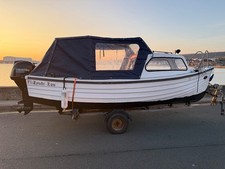 2004 Fisherman 17 Fishing Boat Powered by 2015 Tohatsu 25hp EFI And Trailer.