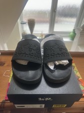 Black Coach 3D Logo Slides