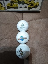 3 Novelty Film Studios Golf Balls.