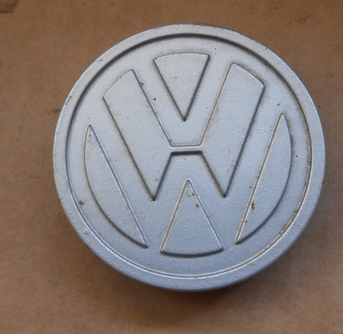 Genuine alloy wheel centre - vw,