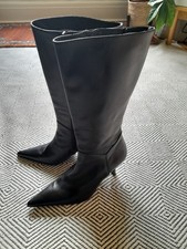 Ladies knee high boots. Black leather. Size 3/36. Made in Italy. Stilleto heel. 