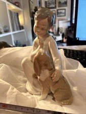Lladro Boy Hushing Dog