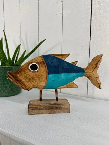 Carved wooden fish stand - on,
