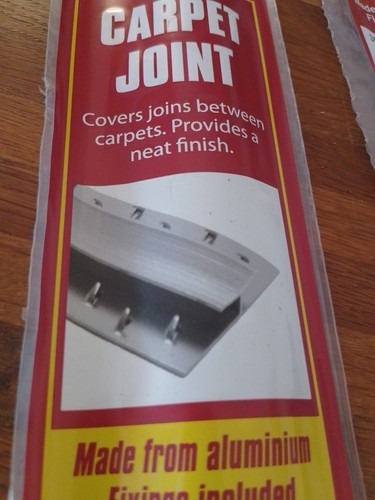 Dual carpet grip - carpet, door