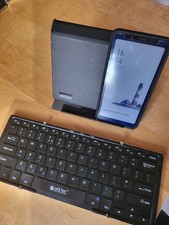 Esynic folding keyboard and stand. Stunning rose-gold aluminium.