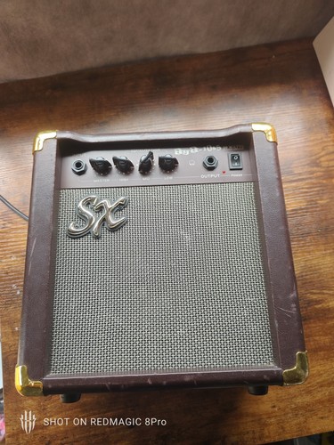 Acoustic guitar amplifier - sx,