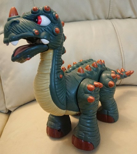 Walking roaring green dinosaur - green,