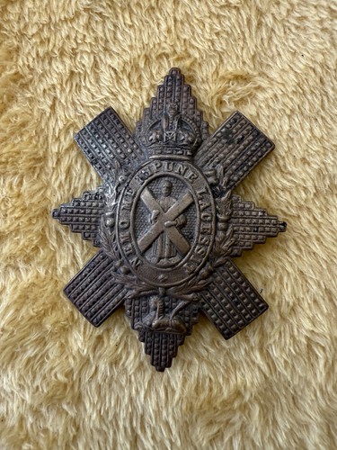 Vintage cap badge - a, the