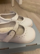 White leather baby shoes