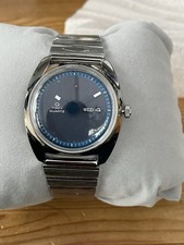 Q Timex 1975 Enigma Reissue