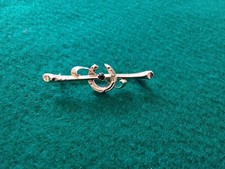 9ct gold horse Shoe And Crop