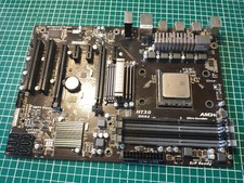 AMD FX-6350 with Gigabyte ATX motherboard and stock AMD cooler.