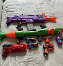 Assorted Nerf Guns Including 4 Fortnite Guns and bundle Of Various Foam bullets